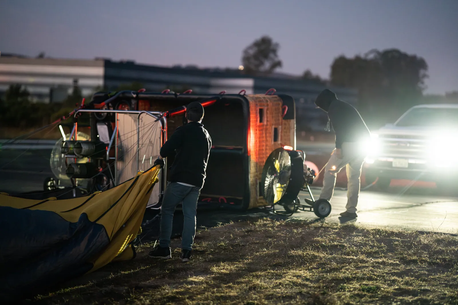 Crew preparing the balloon and trailer before dawn